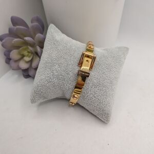 MICHAEL KORS Gold Tone Logo Belt Type Bracelet